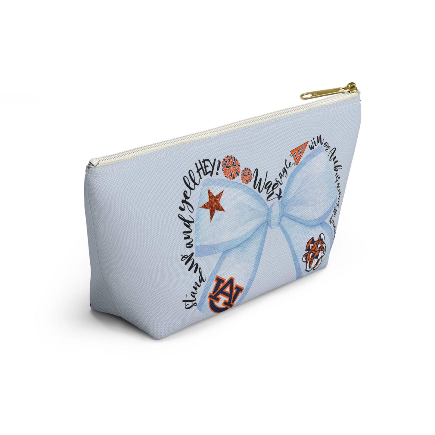 Light-blue T-bottom cosmetic pouch featuring a watercolor blue bow and Auburn logo with collegiate icons and gold zipper pull