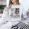 Vintage retro Halloween skeleton ghost graphic sweatshirt with pumpkin