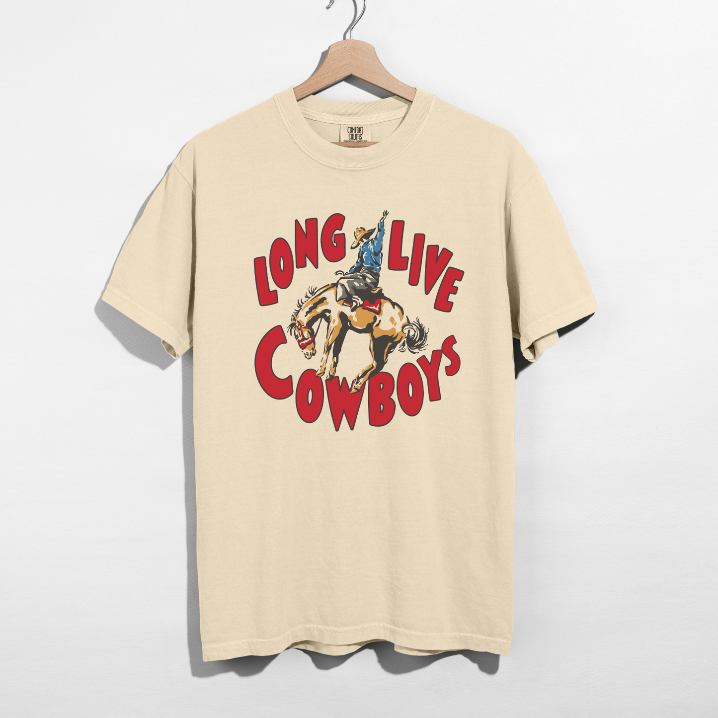 Long Live Cowboys Graphic Tee in beige with a vintage rodeo bucking horse and cowboy design in red and brown tones