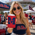 Ole Miss M Logo Can Cooler in red with large navy M and Ole Miss script, held by smiling woman at a tailgate event