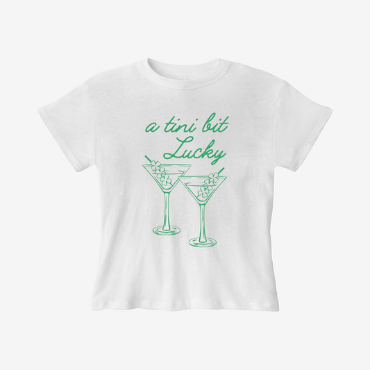 Tini Bit Lucky Tee white women's T-shirt with green script and shamrock martini glass graphic