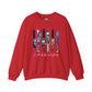 A red crewneck sweatshirt featuring a graphic of six knives with colorful tie-dye patterns and the word 'FRIENDS' in a neon gradient font below it, displayed on a clean white background.