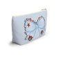 Light-blue T-bottom pouch with blue bow Auburn logo, collegiate icons, and gold zipper pull
