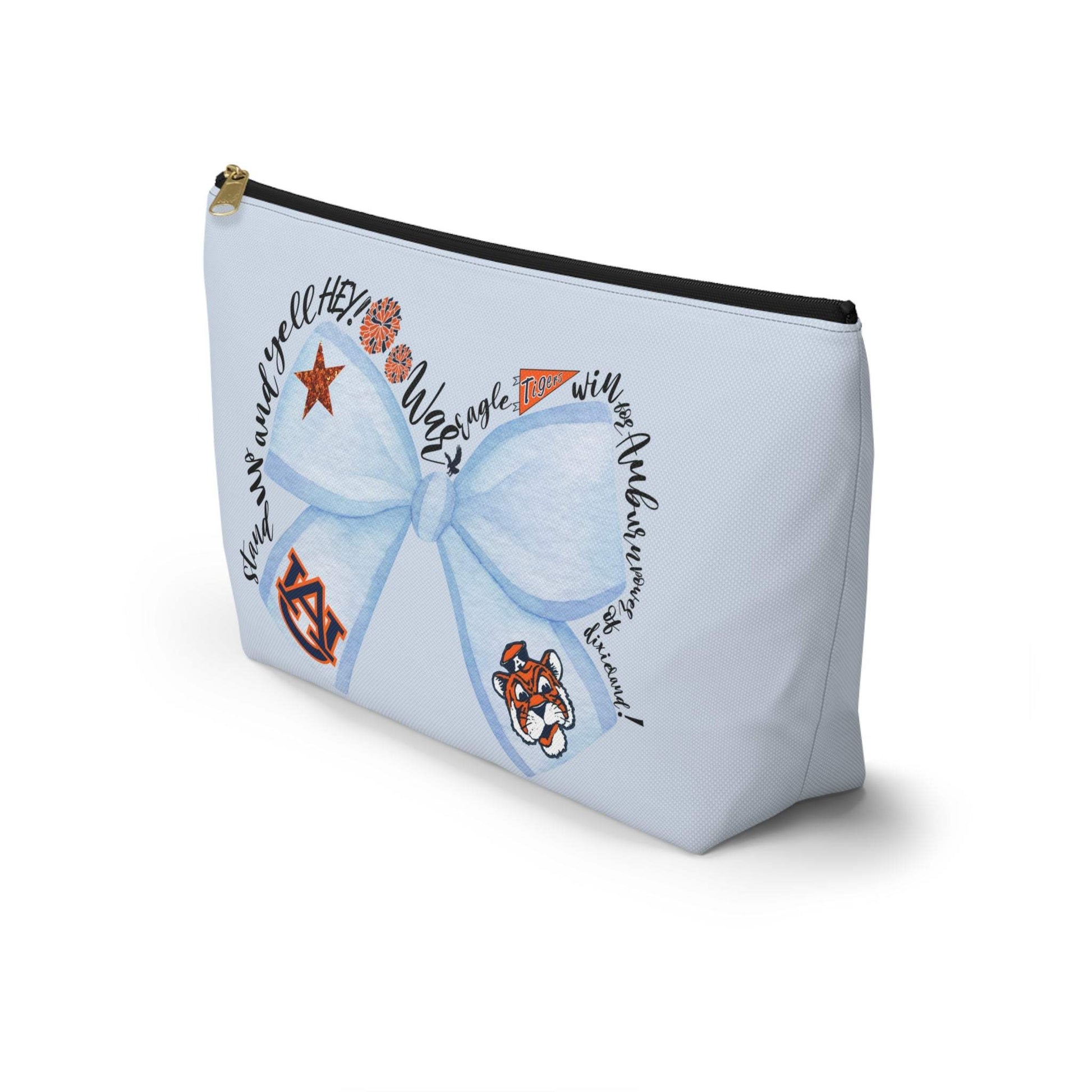 Light-blue Blue Bow Auburn Logo accessory pouch with T-bottom, gold zipper pull, and collegiate icons on front