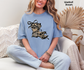Louisiana camo bow graphic printed on a Comfort Colors T-shirt
