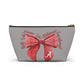 Crimson Bow Alabama script accessory pouch with vibrant red bow and gold zipper puller on muted background