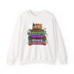 An off-white crewneck sweatshirt featuring a colorful graphic VHS tapes print on the front with cartoon characters and Halloween-themed text including 'Halloween House of Horror' and 'Casper'.