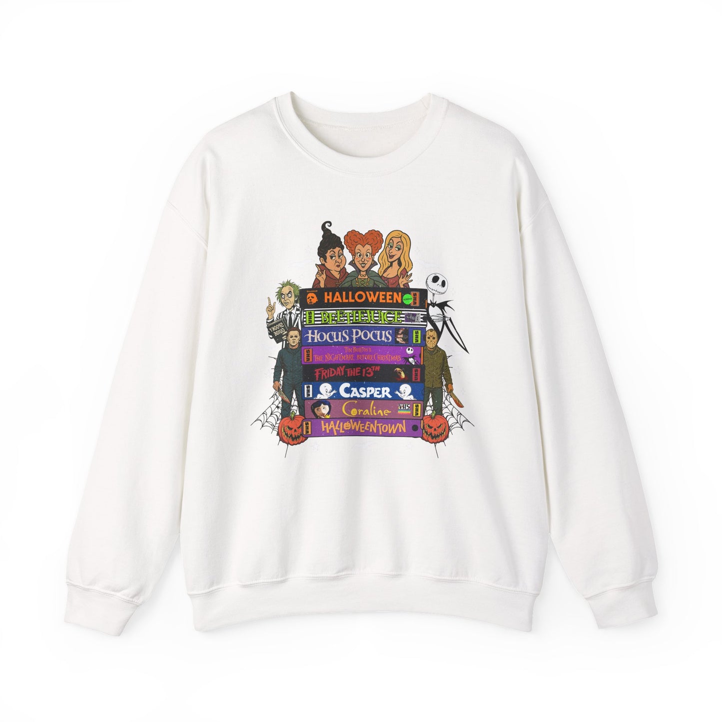 An off-white crewneck sweatshirt featuring a colorful graphic VHS tapes print on the front with cartoon characters and Halloween-themed text including 'Halloween House of Horror' and 'Casper'.