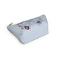Light-blue Blue Bow Auburn Logo accessory pouch with T-bottom, gold zipper pull, and collegiate icons on the front