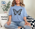 Finding My Wings butterfly graphic on a Washed Denim Comfort Colors T-shirt