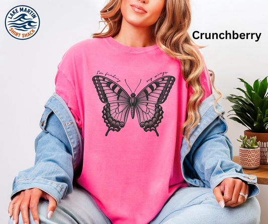 Finding My Wings butterfly graphic on a crunchberry Comfort Colors T-shirt