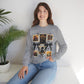 Woman wearing a sport grey crewneck sweatshirt featuring a vintage witch-themed Halloween collage with black bows, bats, pumpkins, and orange accents.
