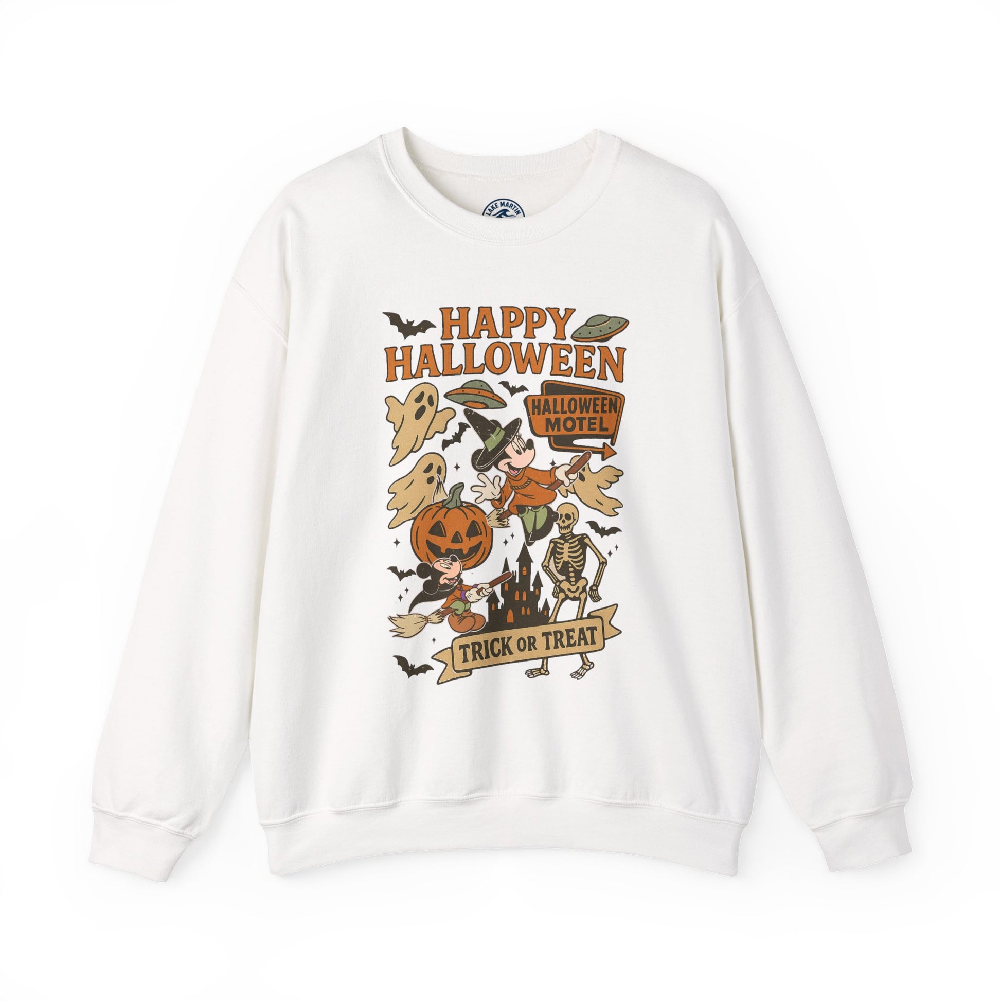 An white crewneck sweatshirt featuring a colorful 'Happy Halloween' graphic print on the front with illustrations of a witch, skeleton, ghost, and a jack-o'-lantern.