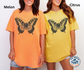 Finding My Wings butterfly graphic on a melon and citrus Comfort Colors T-shirt