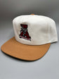 Alabama Crimson Tide snapback hat in white cotton with a tan brim and embroidered Crimson Tide mascot patch