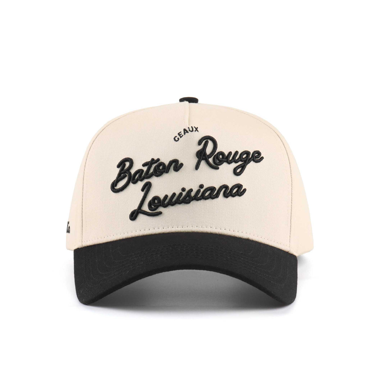 Baton Rouge beige and black trucker hat with embroidered script, Louisiana lettering, and pre-curved brim