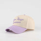 Trucker hat in beige and lavender with embroidered Baton Rouge Louisiana script and curved brim, Callin’ Baton Rouge!