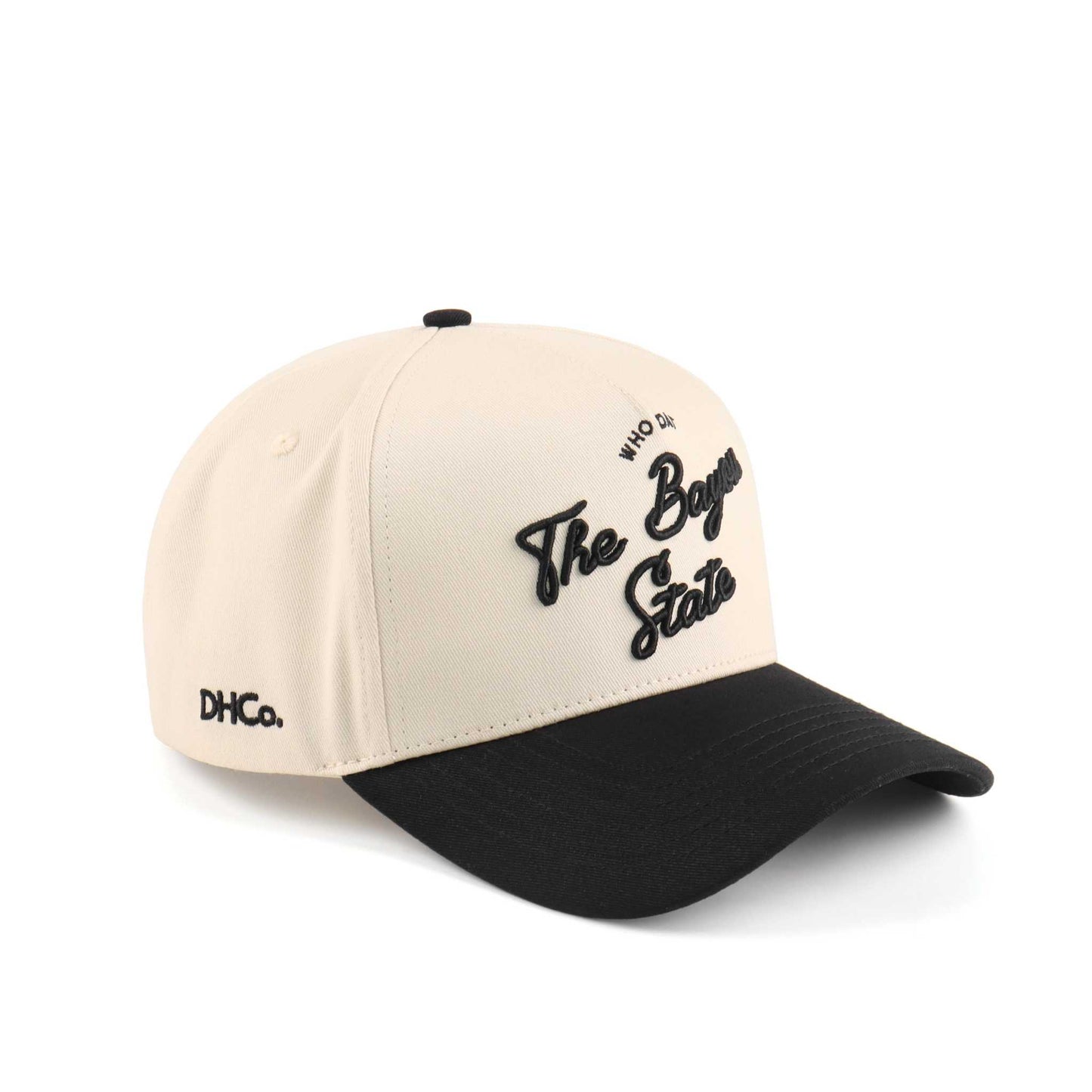 Bayou Script Hat in beige and black with embroidered script lettering and a pre-curved brim