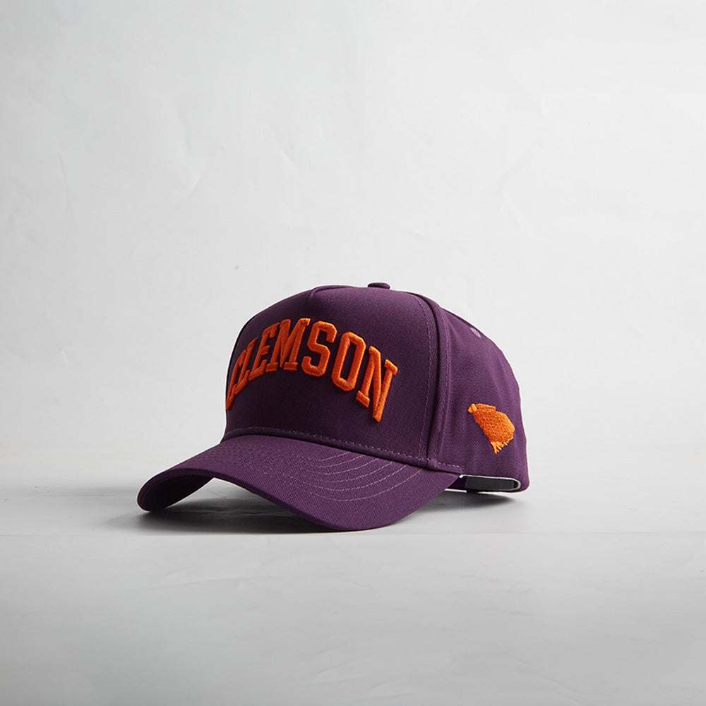 Clemson South Carolina purple snapback cap with orange 3D embroidery and stitched state logo detail