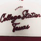College Station Script Hat with cream fabric and maroon embroidered College Station Texas script