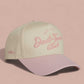 Dad-Town Script Hat in beige and light pink, featuring embroidered script lettering and a pre-curved brim
