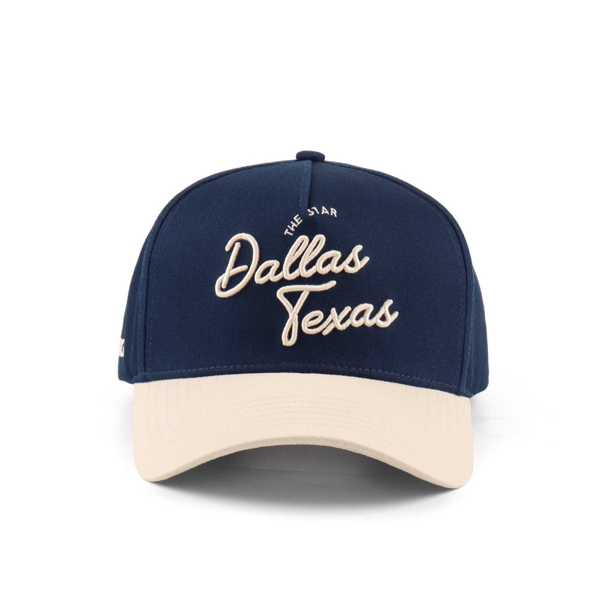 Dallas Script Hat in navy and beige with embroidered Dallas Texas script and a pre-curved brim