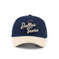 Dallas Script Hat in navy and beige with embroidered Dallas Texas script and a pre-curved brim
