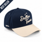 Dallas Script Hat, navy and beige cotton cap with embroidered Dallas Texas script and pre-curved brim