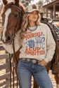 Dolly Parton graphic sweatshirt with Pour Yourself A Cup of Ambition design