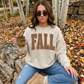 Fall Polka Dot Crewneck Sweatshirt in beige with oversized brown polka dot “FALL” lettering, soft fleece fabric and relaxed fit.