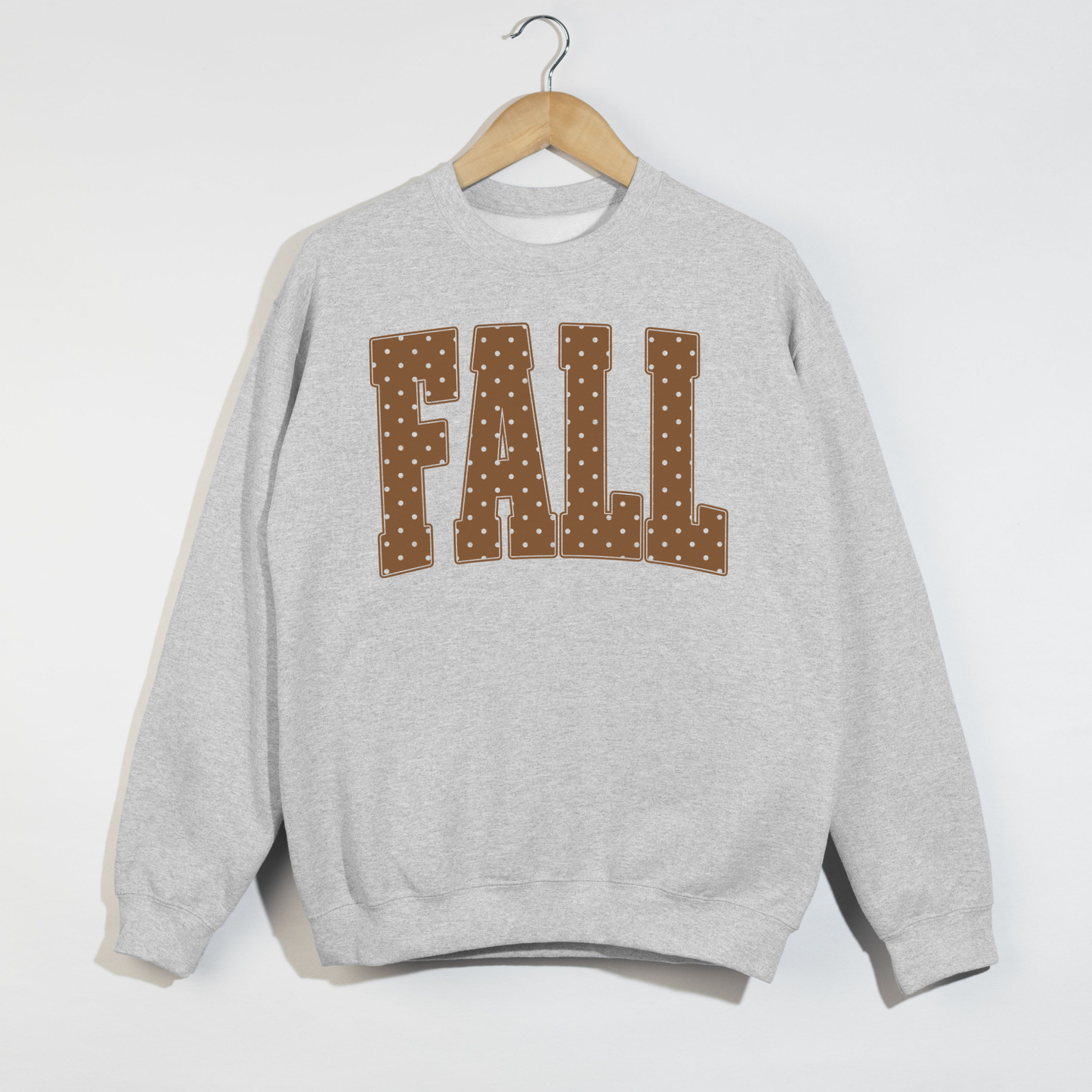 Fall Polka Dot Crewneck Sweatshirt in light grey fleece with oversized brown polka dot collegiate lettering and classic ribbed cuffs and waistband.