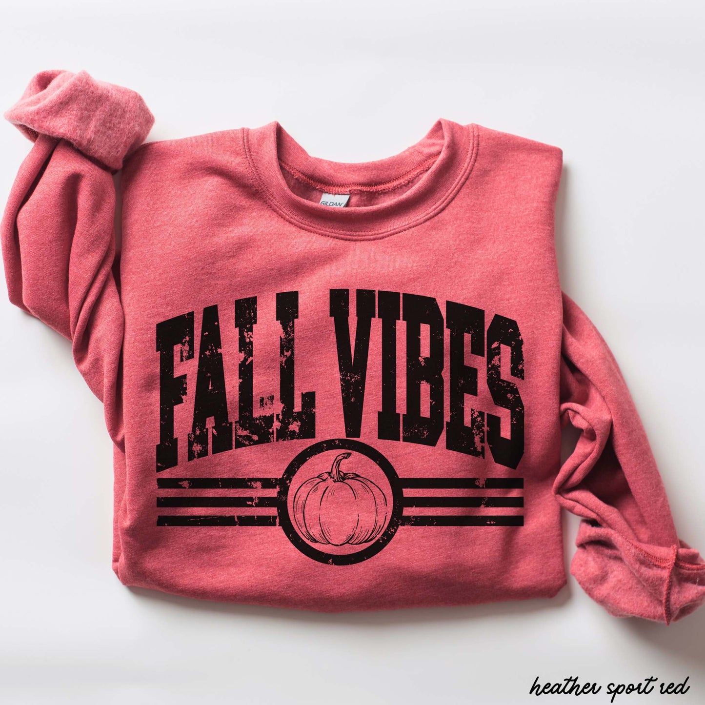 Fall Vibes Sweatshirt in heather sport red cotton blend with distressed black lettering, pumpkin graphic, and stripe details