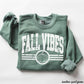 Fall Vibes Sweatshirt in heather sport green with distressed white lettering, pumpkin graphic, and stripe details