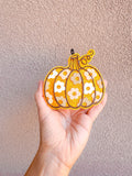 Floral Pumpkin freshie in orange with floral pattern and decorative swirled stem