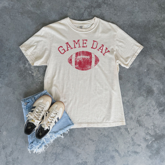 Football Graphic Tee in ivory cotton with distressed red Game Day lettering and football graphic