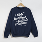 Girls Just Want navy crewneck sweatshirt with white script football graphic, stars, and ribbed cuffs