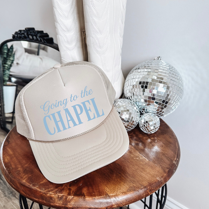 Going to the Chapel Foam Front Trucker Hat in beige with blue script and structured foam front

