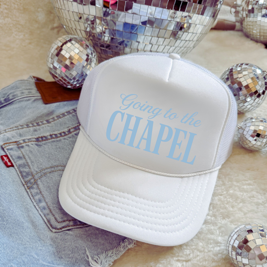 Going to the Chapel Foam Front Trucker Hat in white with light blue chapel lettering and a mesh back