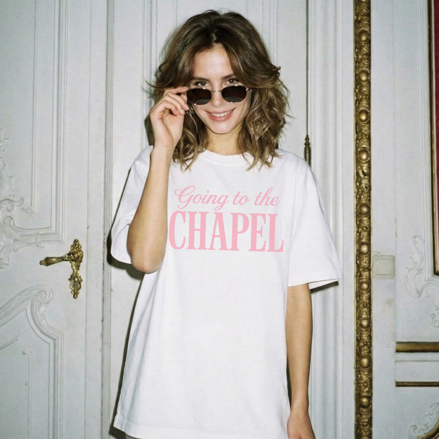 Going to the Chapel Graphic Tee, white cotton shirt with oversized fit and pink script lettering graphic