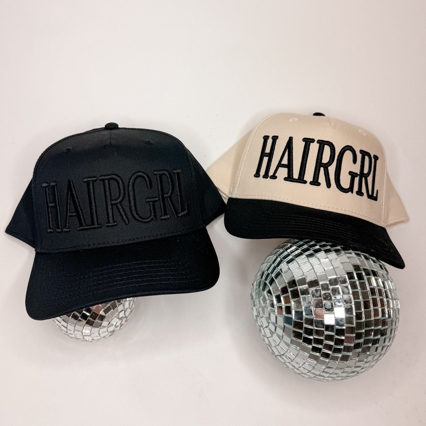 HAIRGRL - Trucker Hat, black and cream caps with bold embroidered lettering and adjustable snapback closures