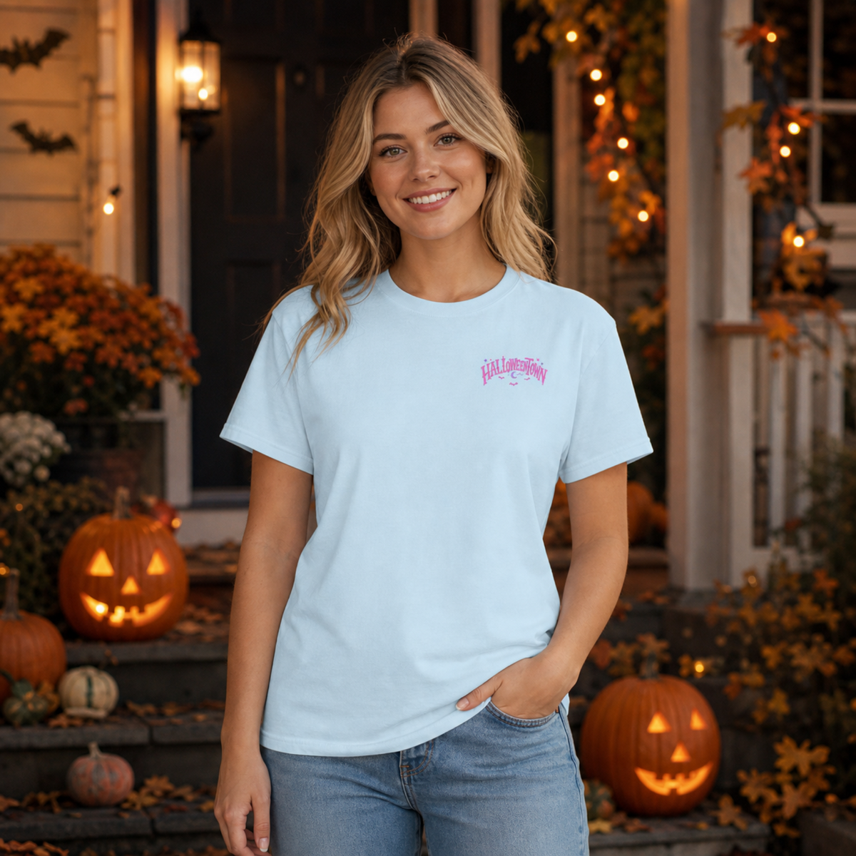 Halloweentown Graphic T-Shirt in light blue cotton with a small pink haunted town graphic on the chest