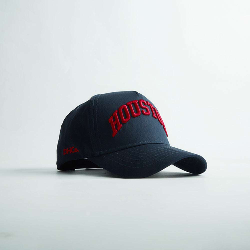 Houston Legacy Snapback in black with red 3D Houston embroidery, curved bill, and structured six-panel crown