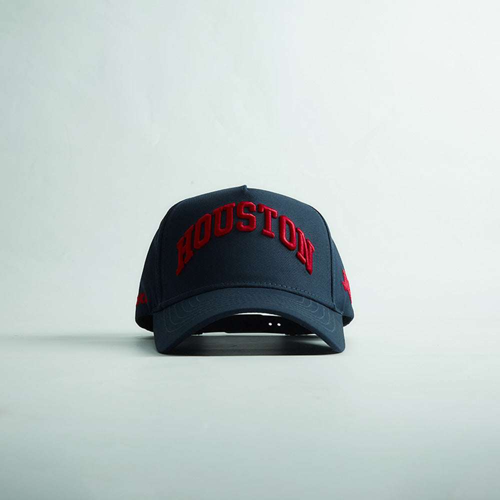 Houston Legacy Snapback in dark navy with red raised Houston embroidery and a curved bill