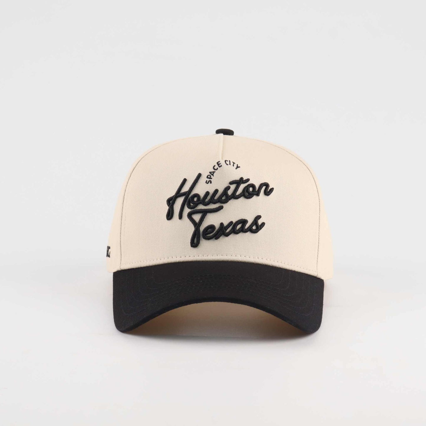 Houston Script Hat in beige and black with embroidered Houston Texas script and a pre-curved brim