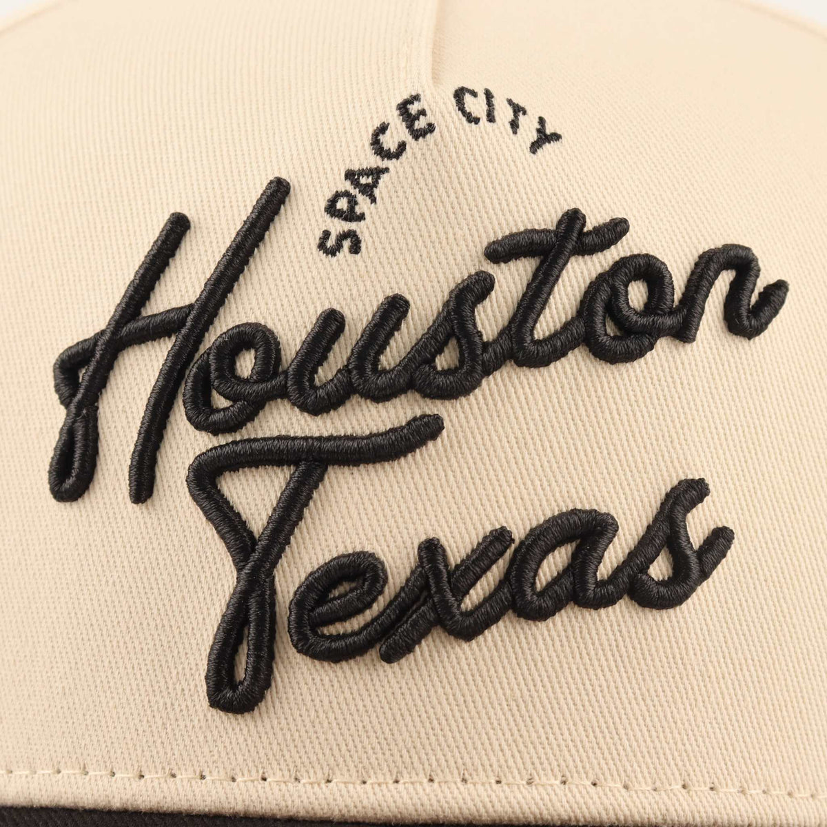 Houston Script Hat in beige cotton with raised black embroidery reading Houston, Space City, Texas