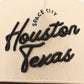Houston Script Hat in beige cotton with raised black embroidery reading Houston, Space City, Texas