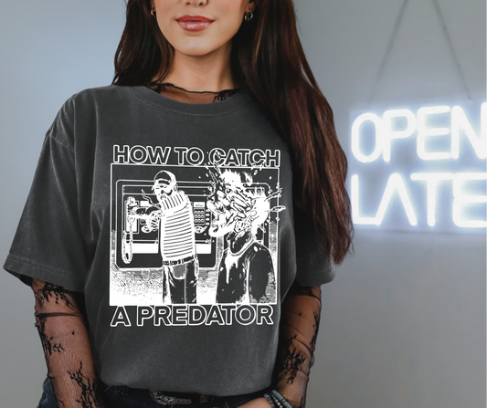 How To Catch a Predator dark gray Comfort Colors cotton T-shirt with white comic-style graphic and bold text