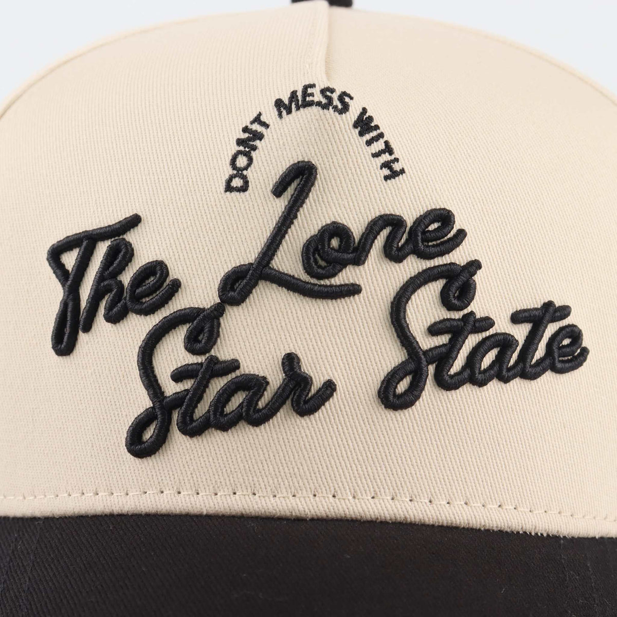 Lone Star Script Hat in beige with raised black embroidered script and pre-curved brim