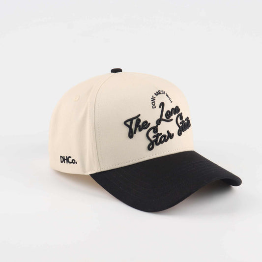 Lone Star Script Hat in beige and black, featuring embroidered script and a pre-curved brim