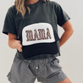 MAMA Leopard Trucker Hat with black mesh and white front panel, featuring bold leopard-print lettering